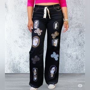Upcycled Molly Made It floral applique & embroidery blue jeans